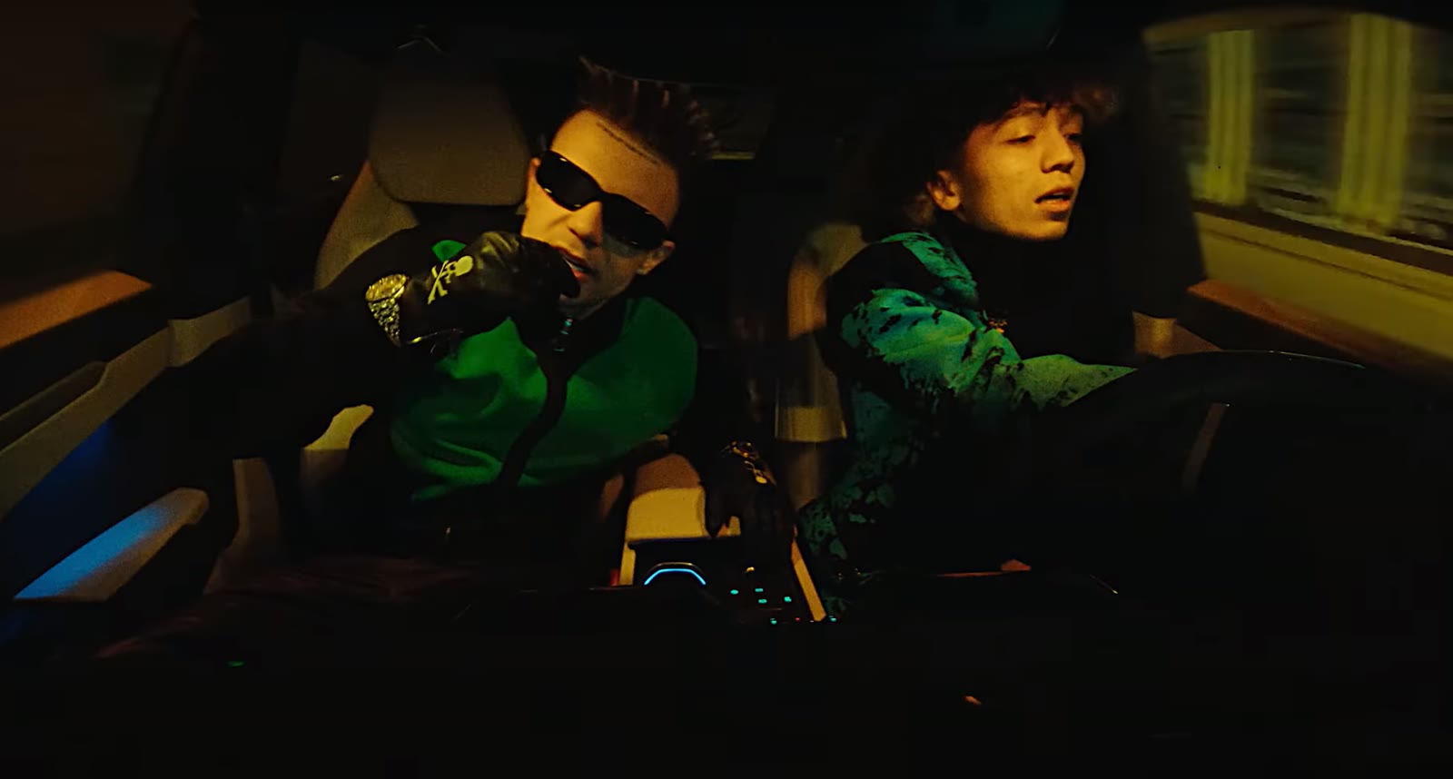 URUS music video — green-lit car interior