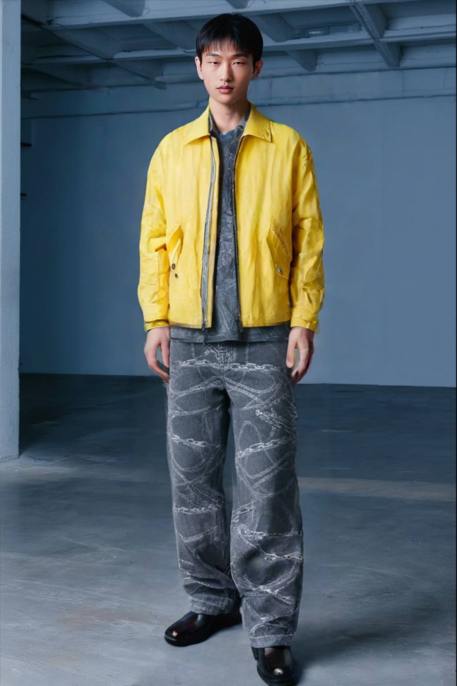 MADH lookbook — yellow jacket and chain-print denim, AI-adapted frame