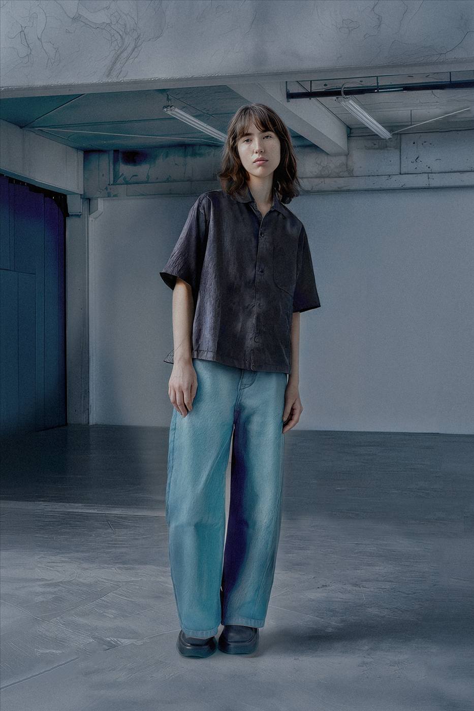 MADH lookbook — dark shirt and washed denim, AI-adapted frame