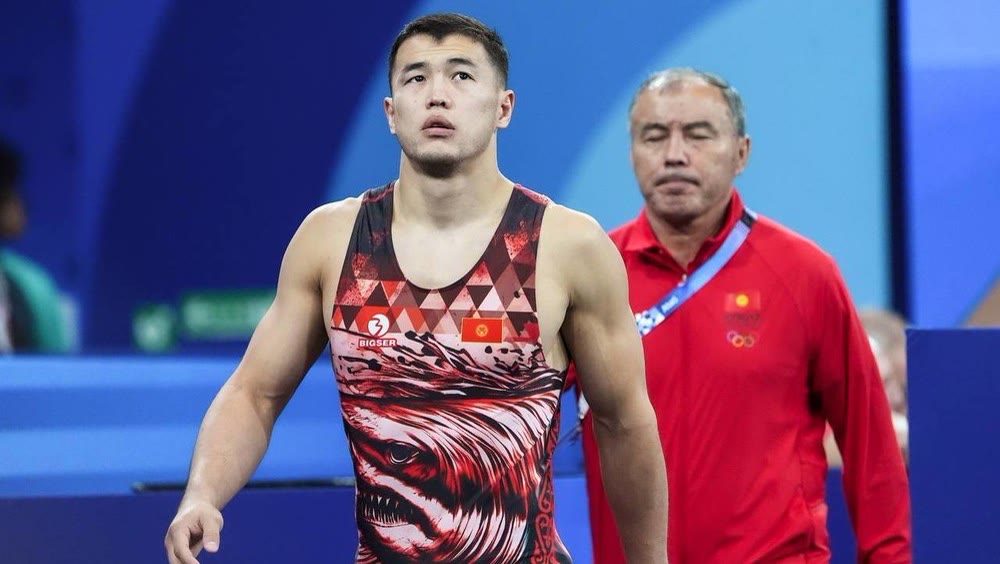 Wrestler walking out in custom singlet, Olympic Games