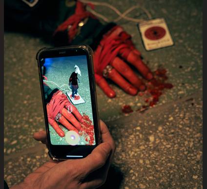 AR demo — phone revealing a virtual figure over the sculpture, EULER AR tag